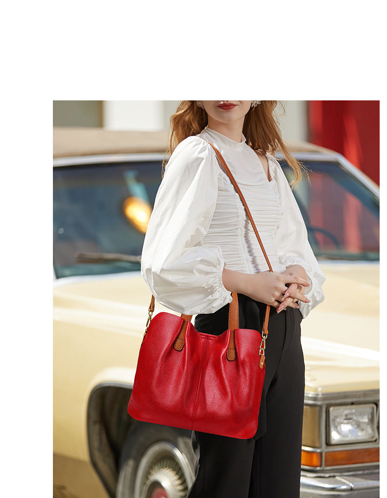 Bolsos de mano CLARI de piel de vaca para mujer