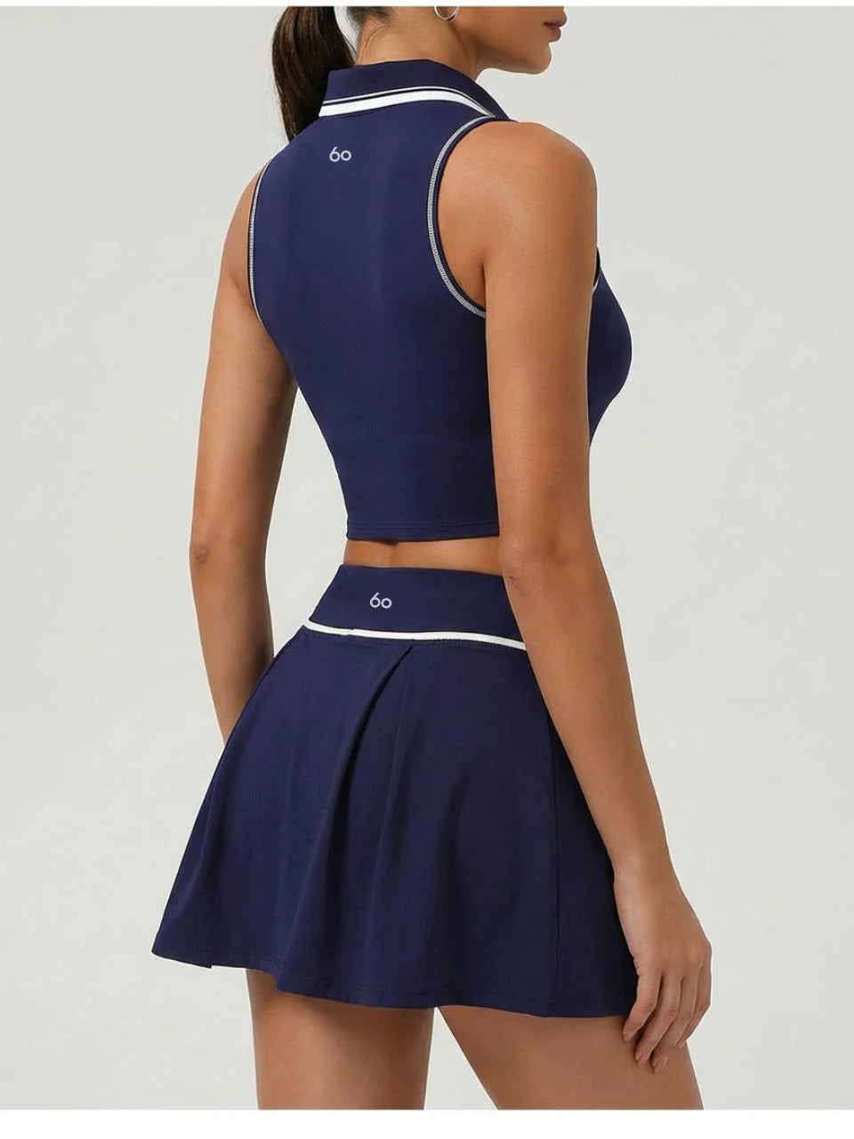 Conjunto deportivo ARALUZ, tenis, top y falda.