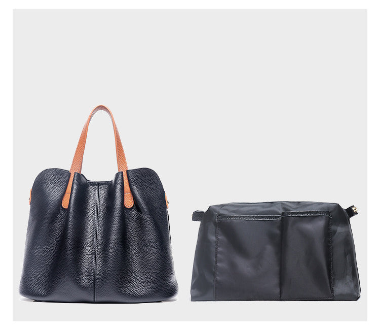 Bolsos de mano CLARI de piel de vaca para mujer