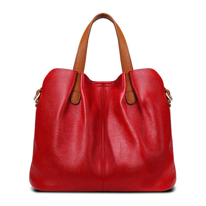 Bolsos de mano CLARI de piel de vaca para mujer