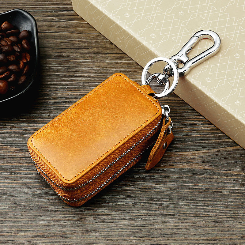 Fundas de cuero vintage para llaves de coche con doble cremallera.