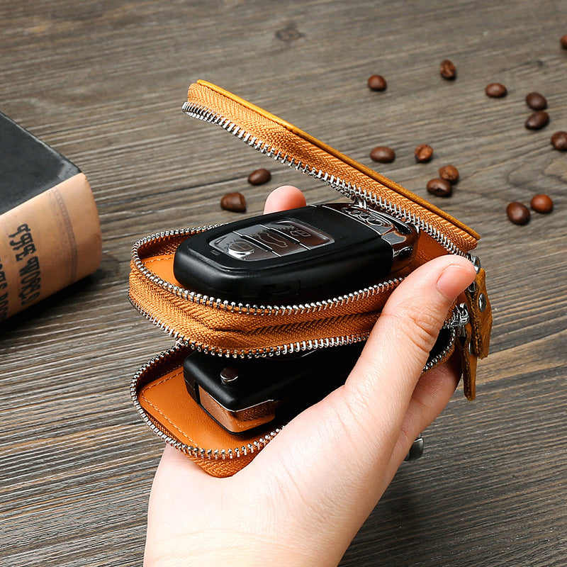 Fundas de cuero vintage para llaves de coche con doble cremallera.