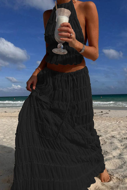 Conjunto DENIS, top cuello halter, falda larga.