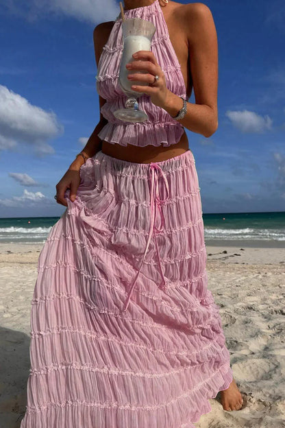 Conjunto DENIS, top cuello halter, falda larga.