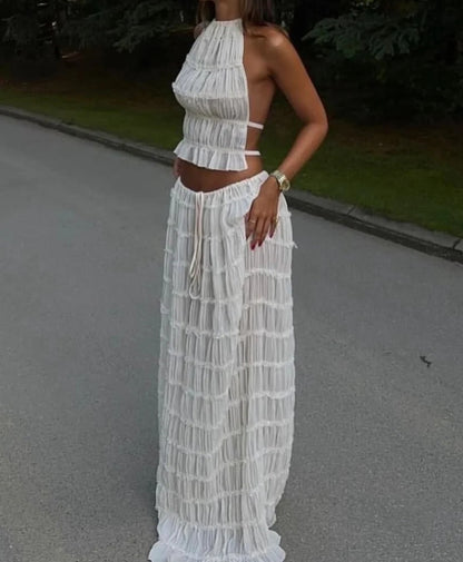 Conjunto DENIS, top cuello halter, falda larga.