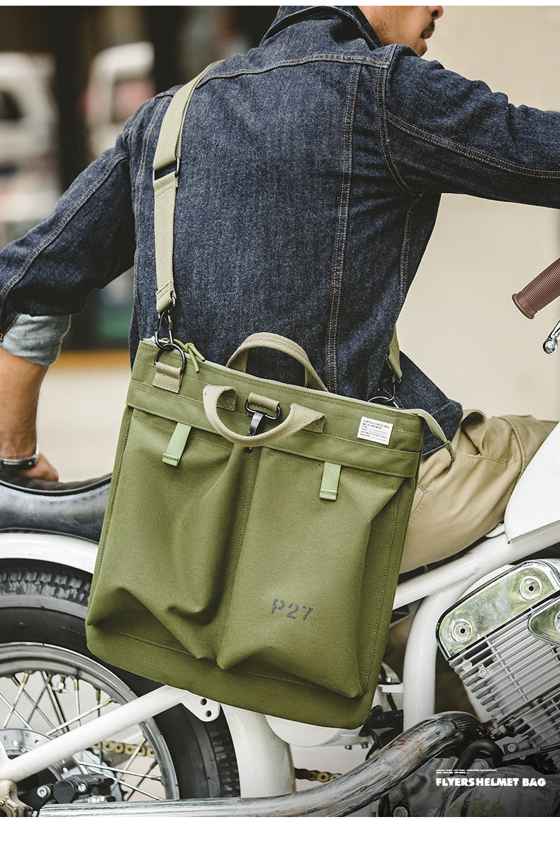 Bolsa LEO para portátil con diseño vintage de lona y casco para hombre.