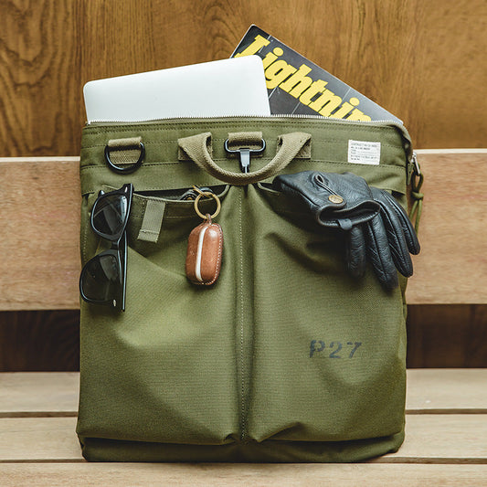 Bolsa LEO para portátil con diseño vintage de lona y casco para hombre.