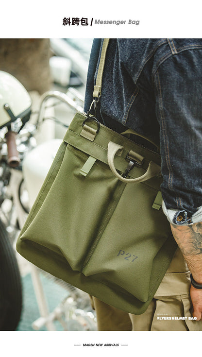 Bolsa LEO para portátil con diseño vintage de lona y casco para hombre.