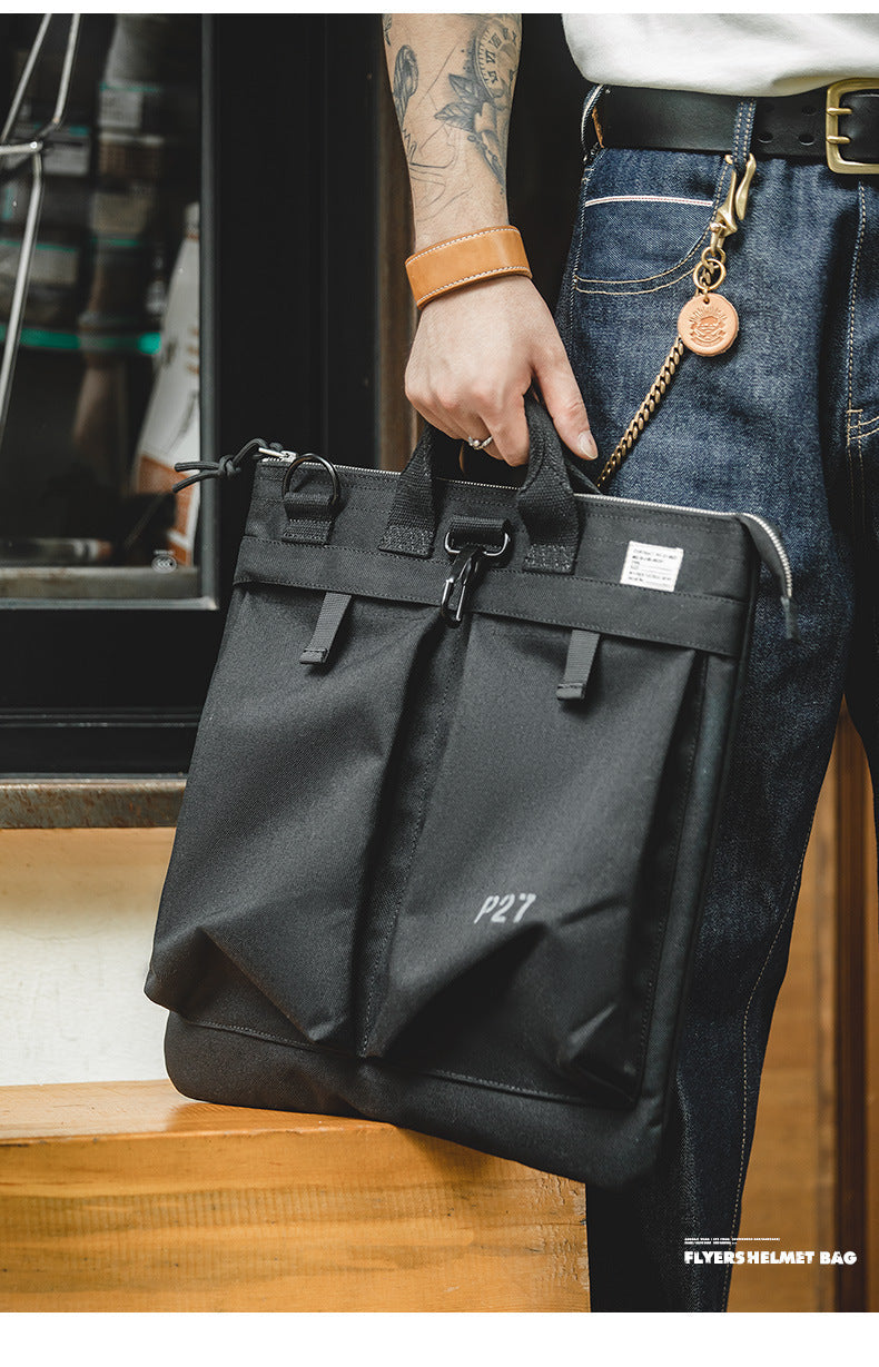 Bolsa LEO para portátil con diseño vintage de lona y casco para hombre.