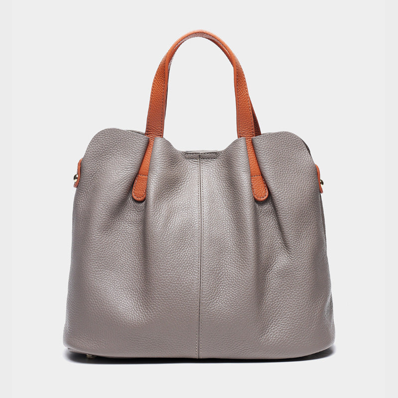 Bolsos de mano CLARI de piel de vaca para mujer