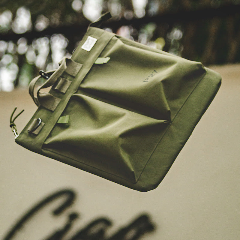 Bolsa LEO para portátil con diseño vintage de lona y casco para hombre.