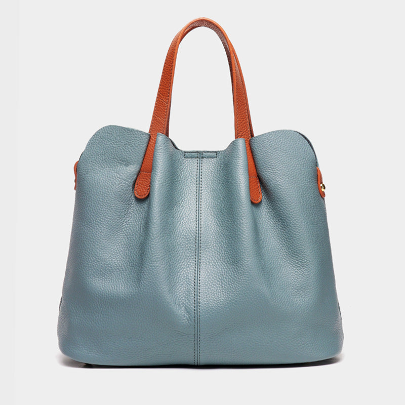 Bolsos de mano CLARI de piel de vaca para mujer