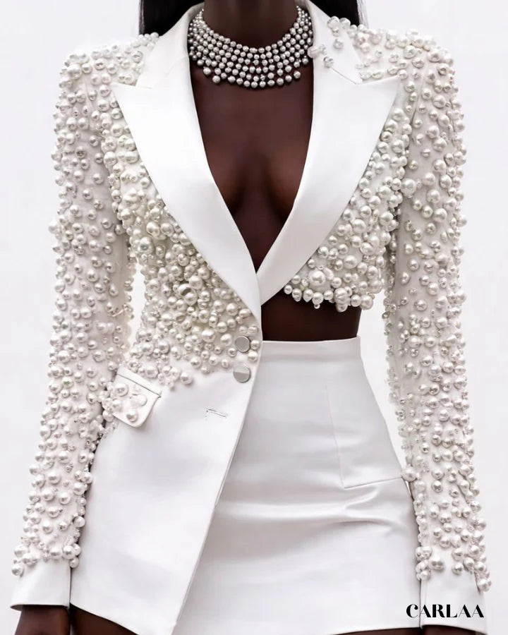 Conjunto Ziria tendencia 2026, dos piezas de perlas empalmadas para mujer, solapa, manga larga, top Irregular, minifalda de cintura alta, traje para mujer, nuevo