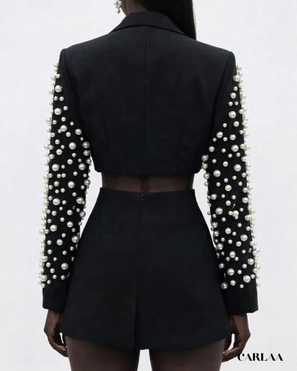 Conjunto Ziria tendencia 2026, dos piezas de perlas empalmadas para mujer, solapa, manga larga, top Irregular, minifalda de cintura alta, traje para mujer, nuevo