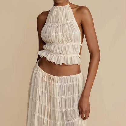 Conjunto DENIS, top cuello halter, falda larga.