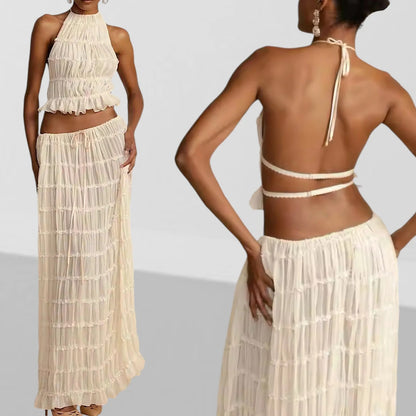 Conjunto DENIS, top cuello halter, falda larga.