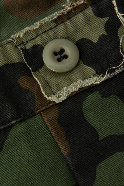 Minifalda COMBAT con flecos y patchwork deshilachado de camuflaje
