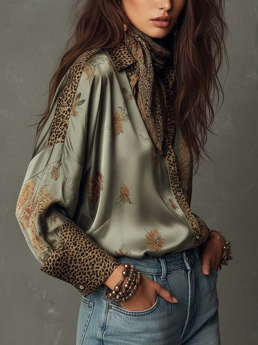 Camisa CARISMA de satén con estampado floral y botones, con ribete de leopardo.