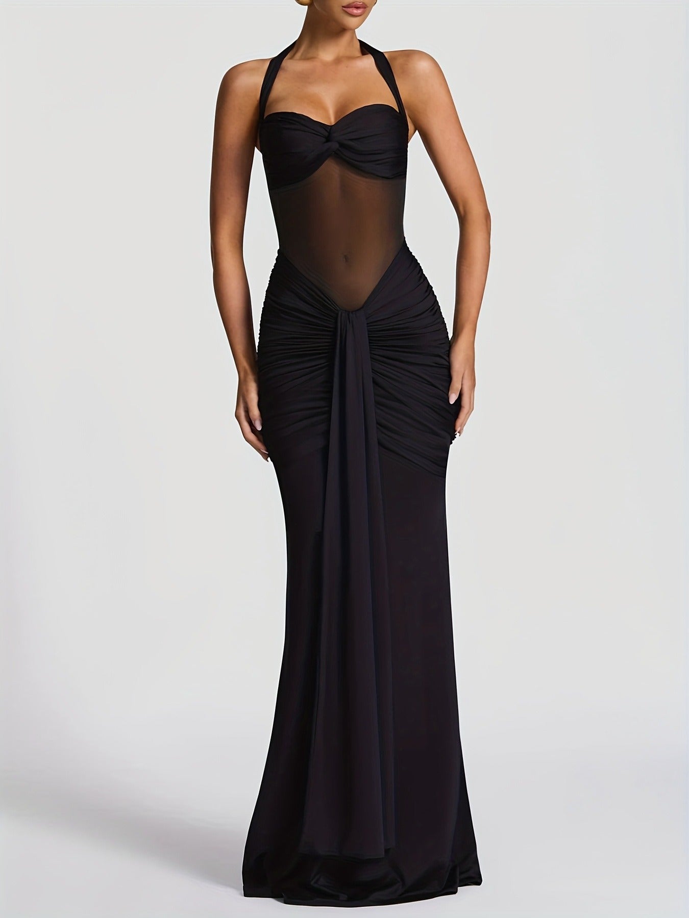 Vestido ICÓNICA, con transparencias y espalda con lazo ajustable.