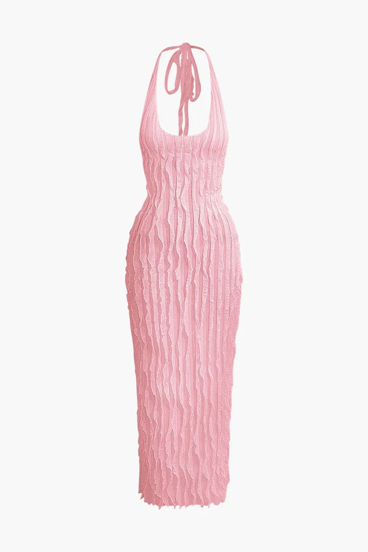 Vestido Maria largo sin espalda con escote halter y textura de volantes transparentes.