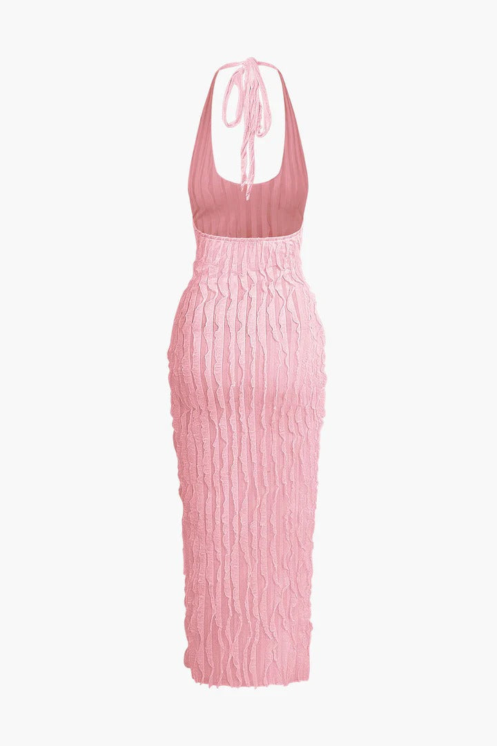 Vestido Maria largo sin espalda con escote halter y textura de volantes transparentes.