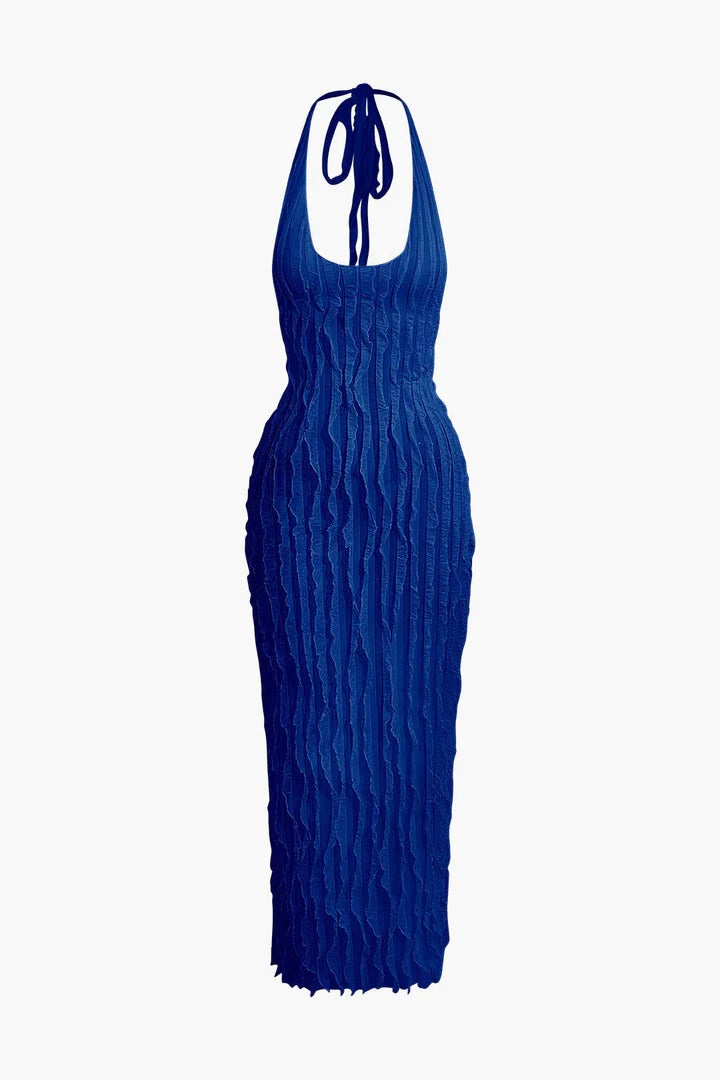 Vestido Maria largo sin espalda con escote halter y textura de volantes transparentes.