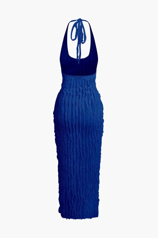 Vestido Maria largo sin espalda con escote halter y textura de volantes transparentes.