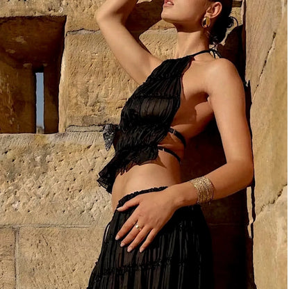 Conjunto DENIS, top cuello halter, falda larga.