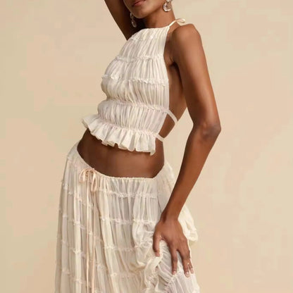Conjunto DENIS, top cuello halter, falda larga.