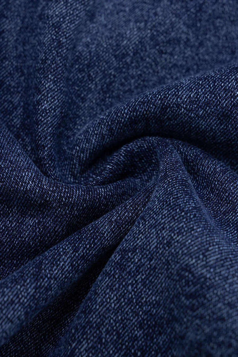 Conjunto IMPERIA denim de top vaquero con cremallera y falda con botones y bolsillos.