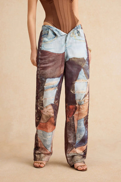 Pantalones COLAGE anchos con botones y bloques de color.