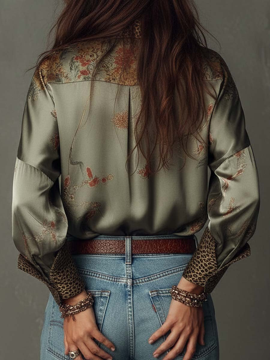 Camisa CARISMA de satén con estampado floral y botones, con ribete de leopardo.