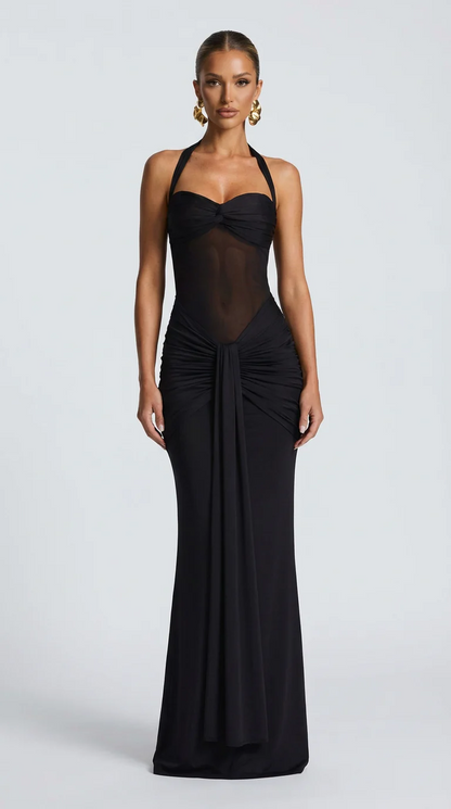 Vestido ICÓNICA, con transparencias y espalda con lazo ajustable.