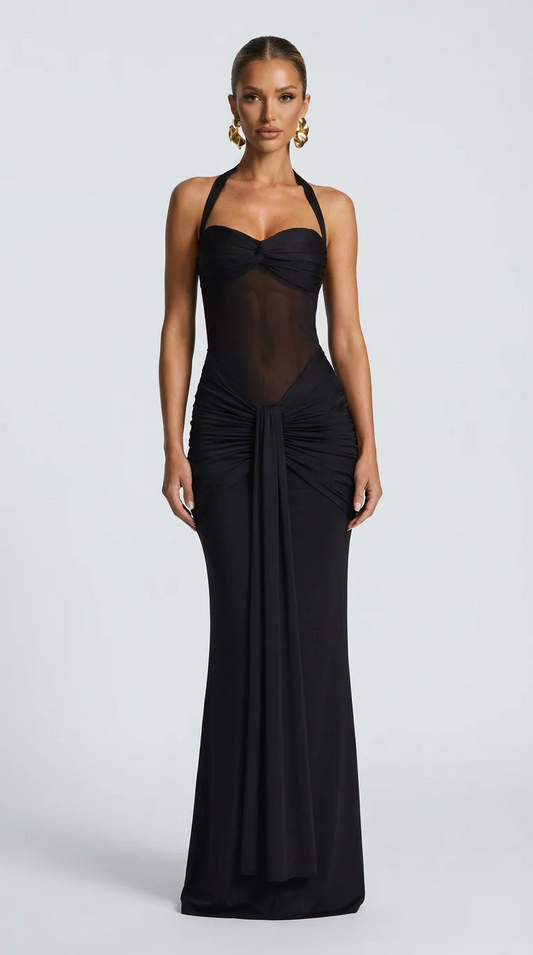 Vestido ICÓNICA, con transparencias y espalda con lazo ajustable.