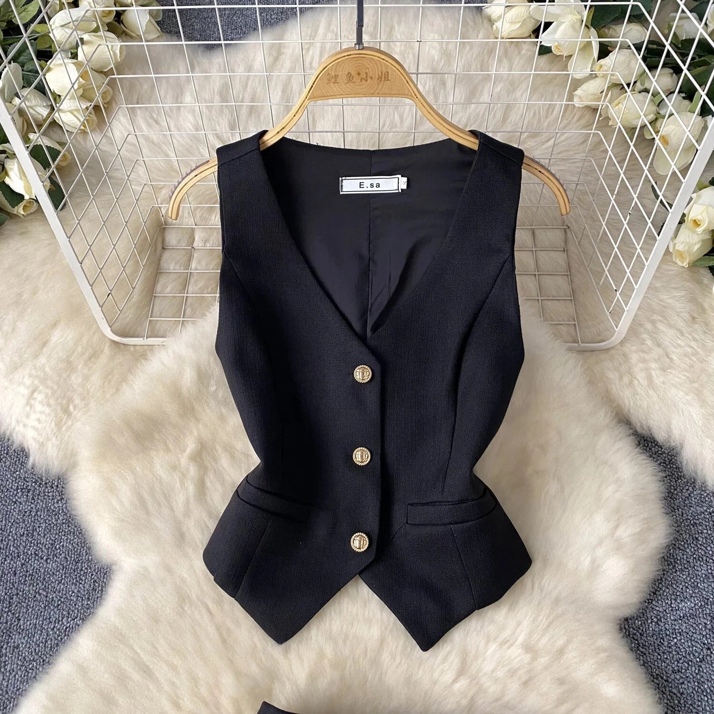 Conjunto POLI de 2 piezas, chaleco y falda.
