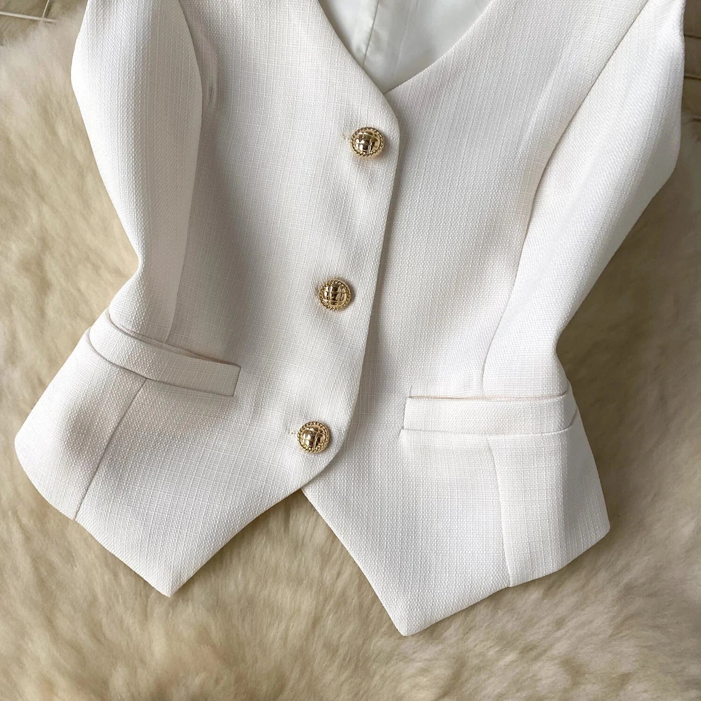 Conjunto POLI de 2 piezas, chaleco y falda.