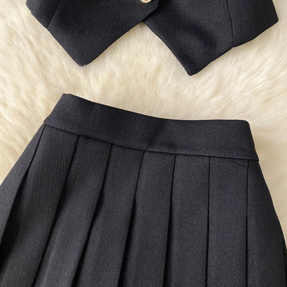 Conjunto POLI de 2 piezas, chaleco y falda.