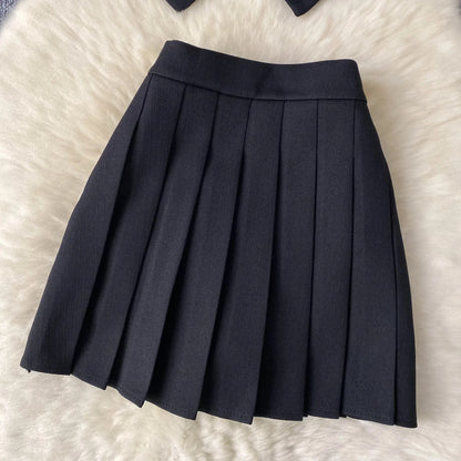 Conjunto POLI de 2 piezas, chaleco y falda.