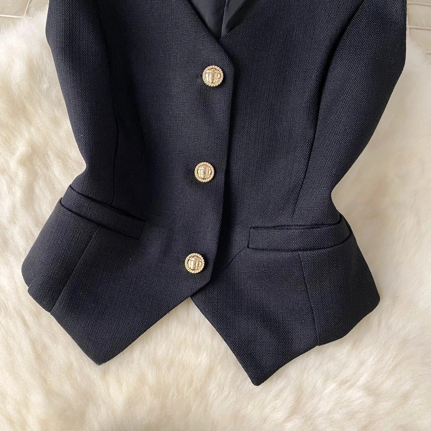 Conjunto POLI de 2 piezas, chaleco y falda.