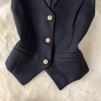 Conjunto POLI de 2 piezas, chaleco y falda.