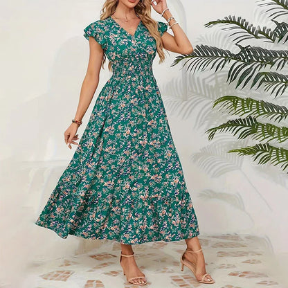 Vestido KIM de verano 2026 con estampado floral, cintura estrecha y falda amplia.